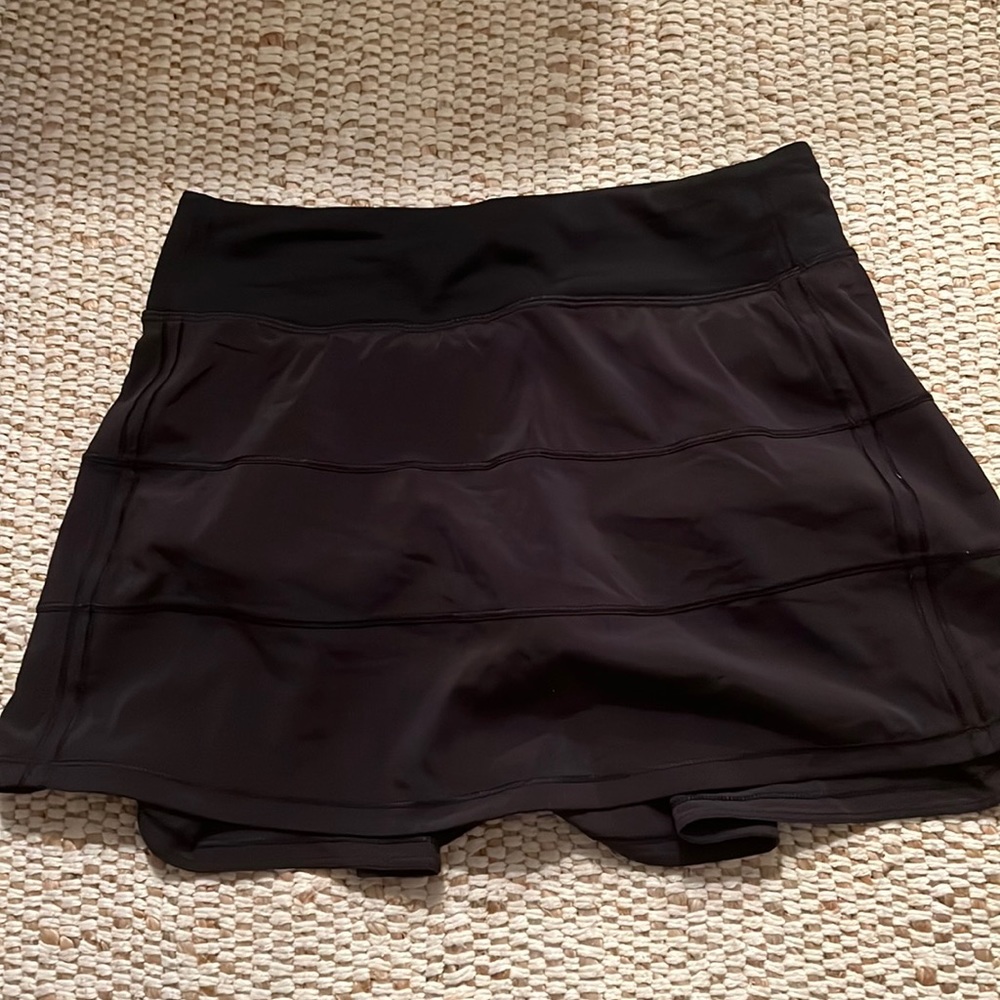 Size 4 Tall Black Lululemon Skirt. Worn once. Perfect condition!